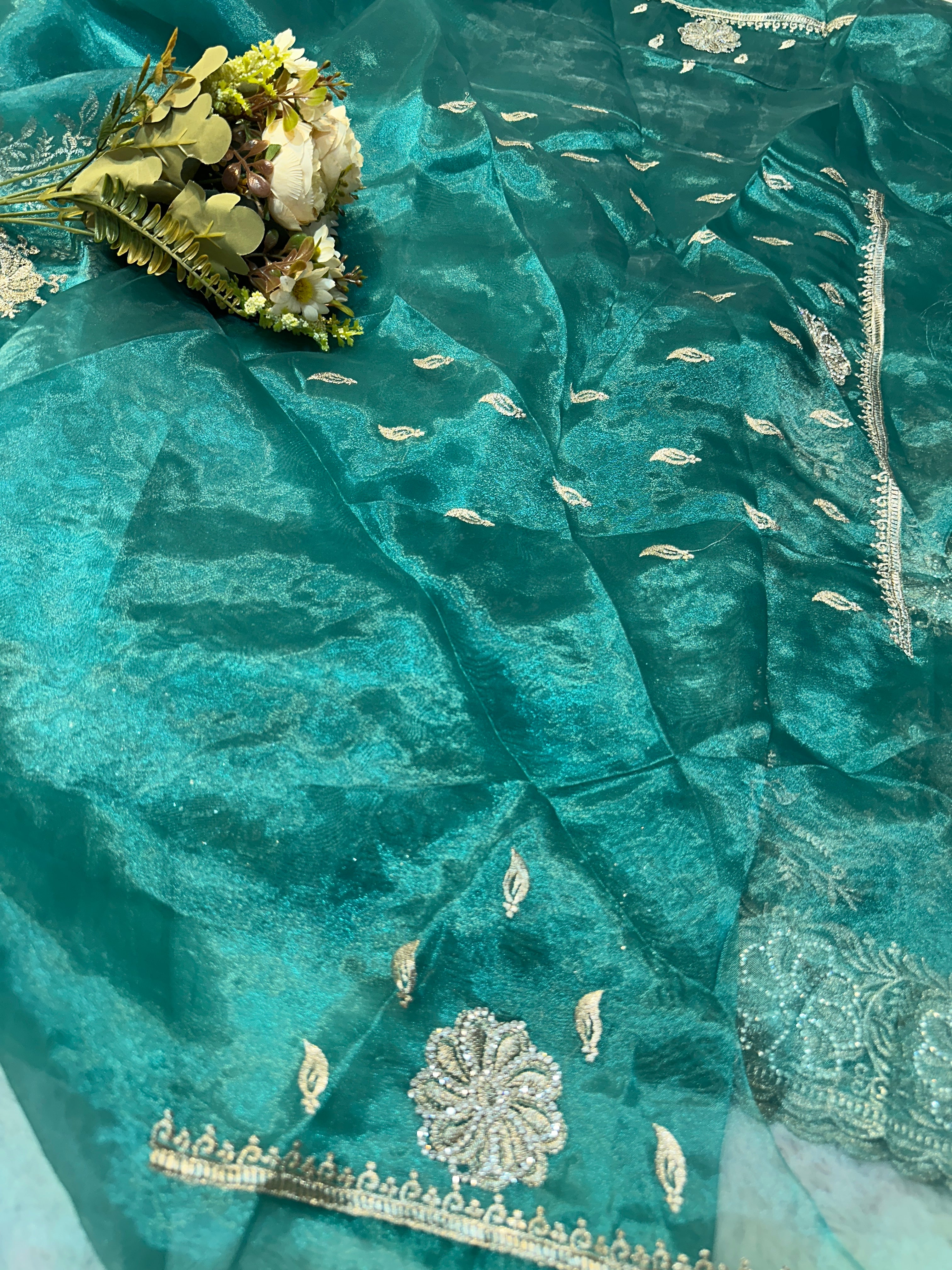 Sea green Organza Saree with Intricate Silver Floral Embroidery