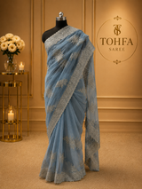 Graceful Dusty Blue Organza Saree with Silver Embroidered Border