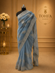Graceful Dusty Blue Organza Saree with Silver Embroidered Border