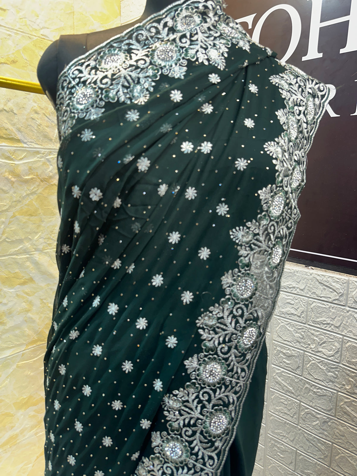 Emerald Green Georgette Saree with Silver Zari & Sequin Embroidery