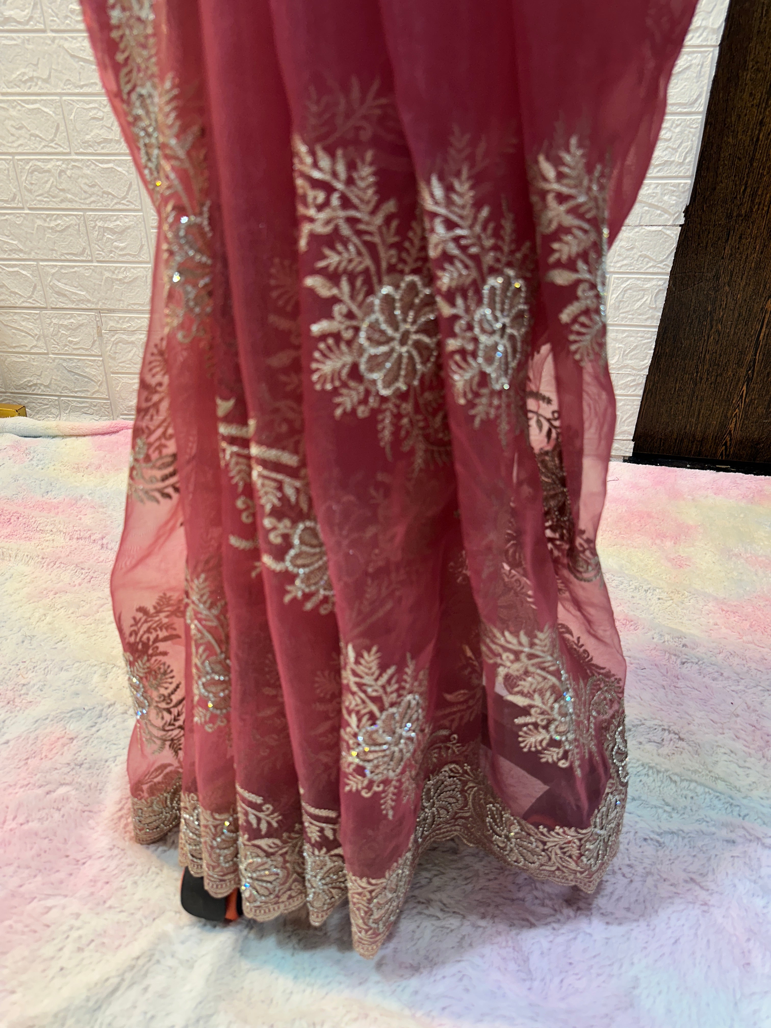 Headline 
Dusty Rose Organza Saree with light gold Zari Embroidery