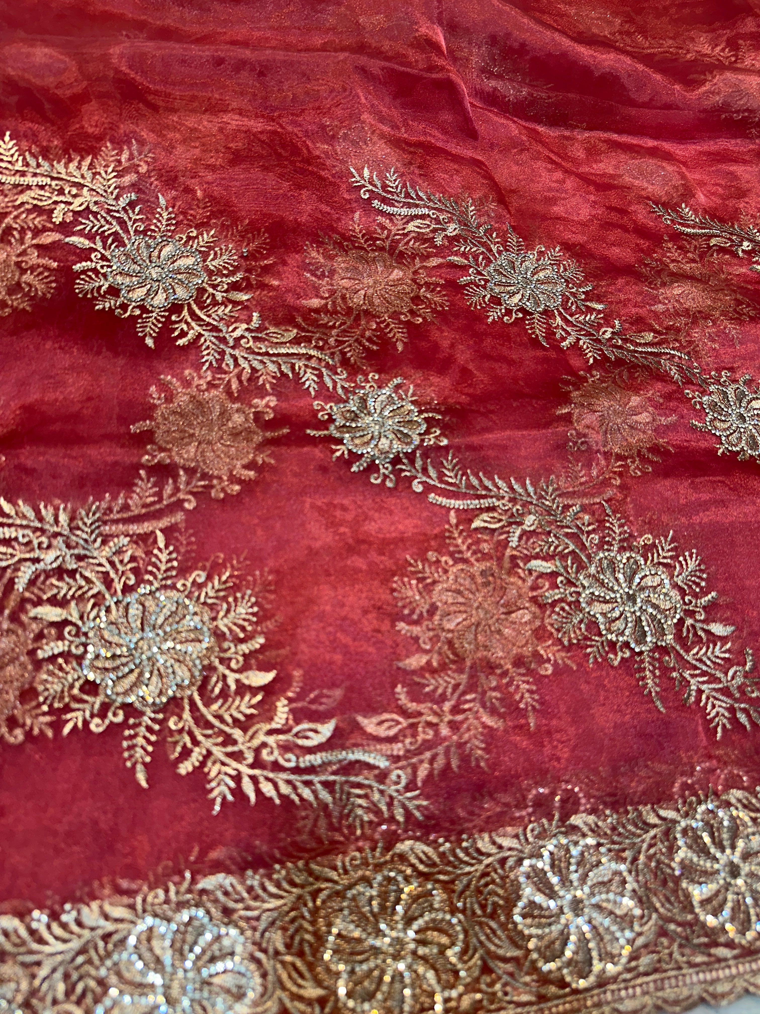 Headline 
Dusty Rose Organza Saree with light gold Zari Embroidery