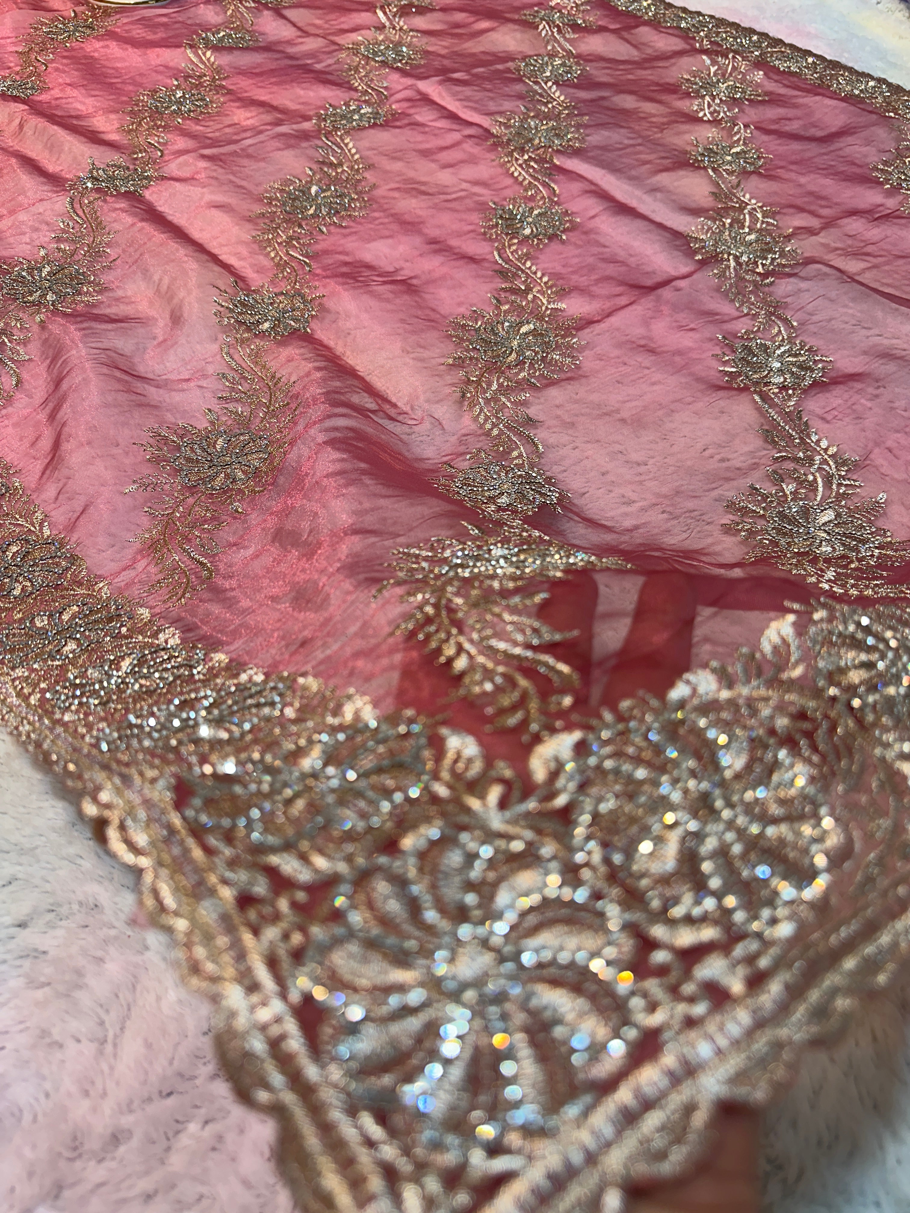 Headline 
Dusty Rose Organza Saree with light gold Zari Embroidery