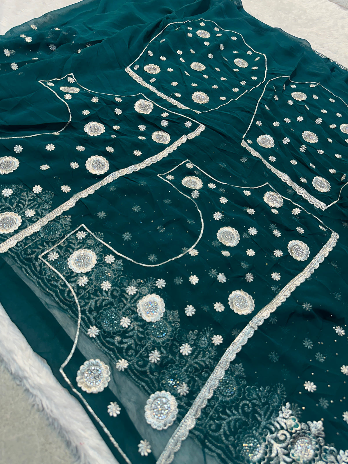 Teal Blue Georgette Saree with Silver Zari & Sequin Embroidery