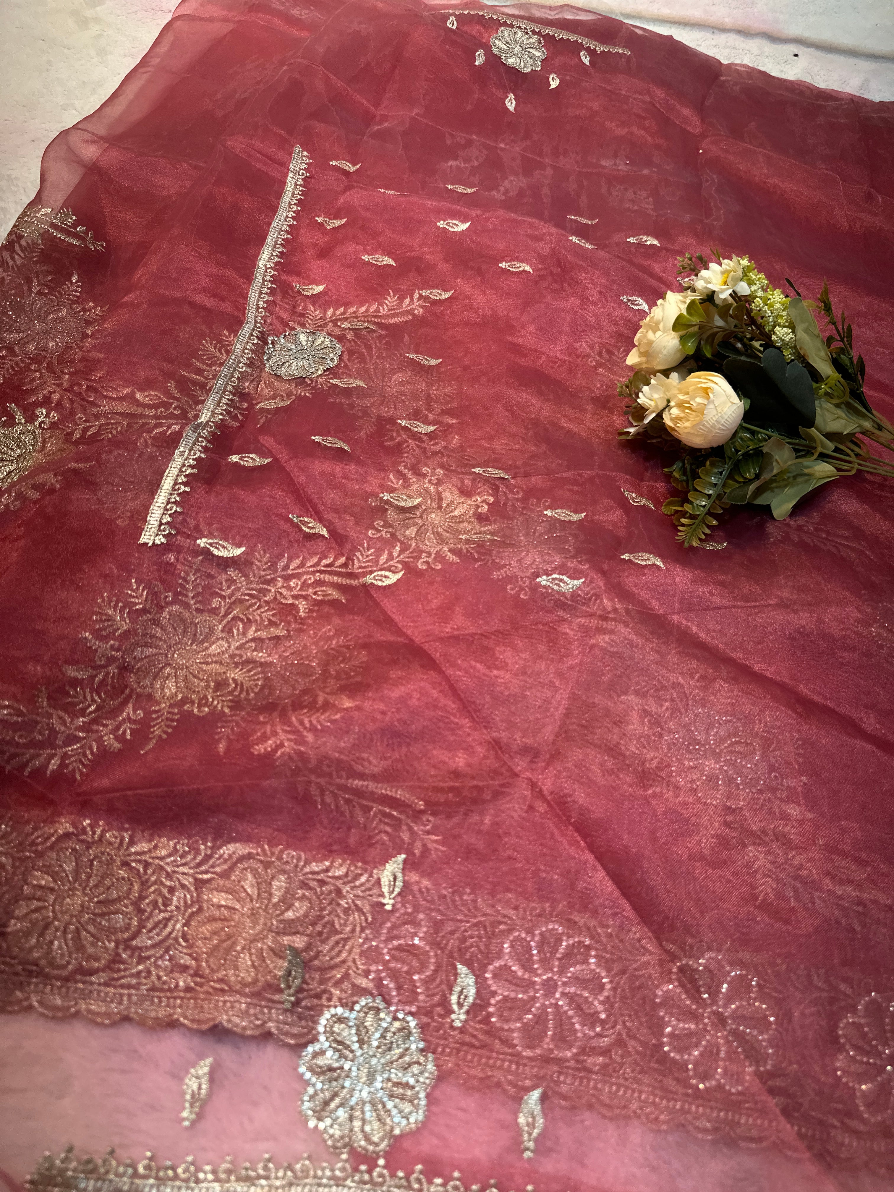 Headline 
Dusty Rose Organza Saree with light gold Zari Embroidery