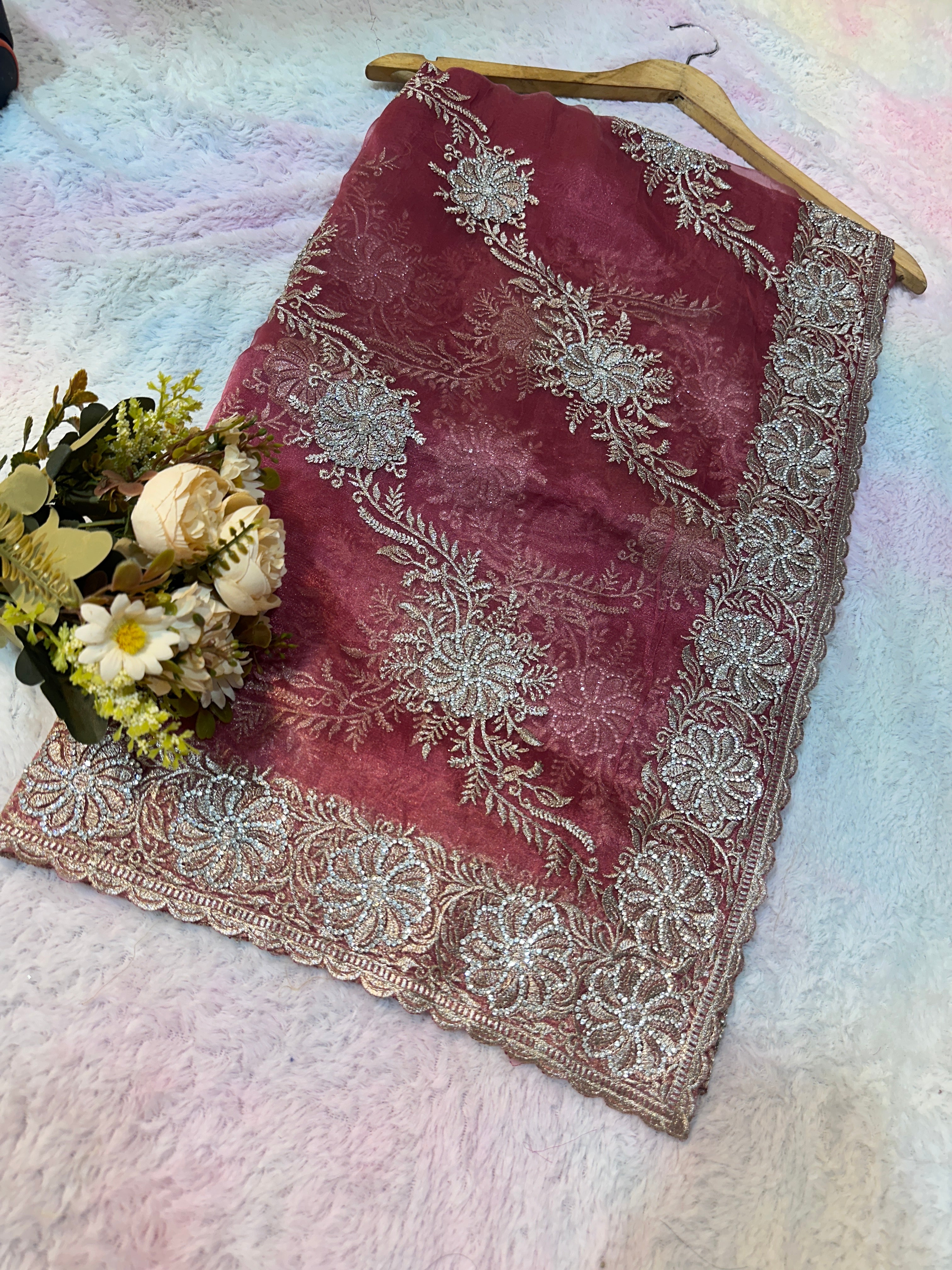 Headline 
Dusty Rose Organza Saree with light gold Zari Embroidery