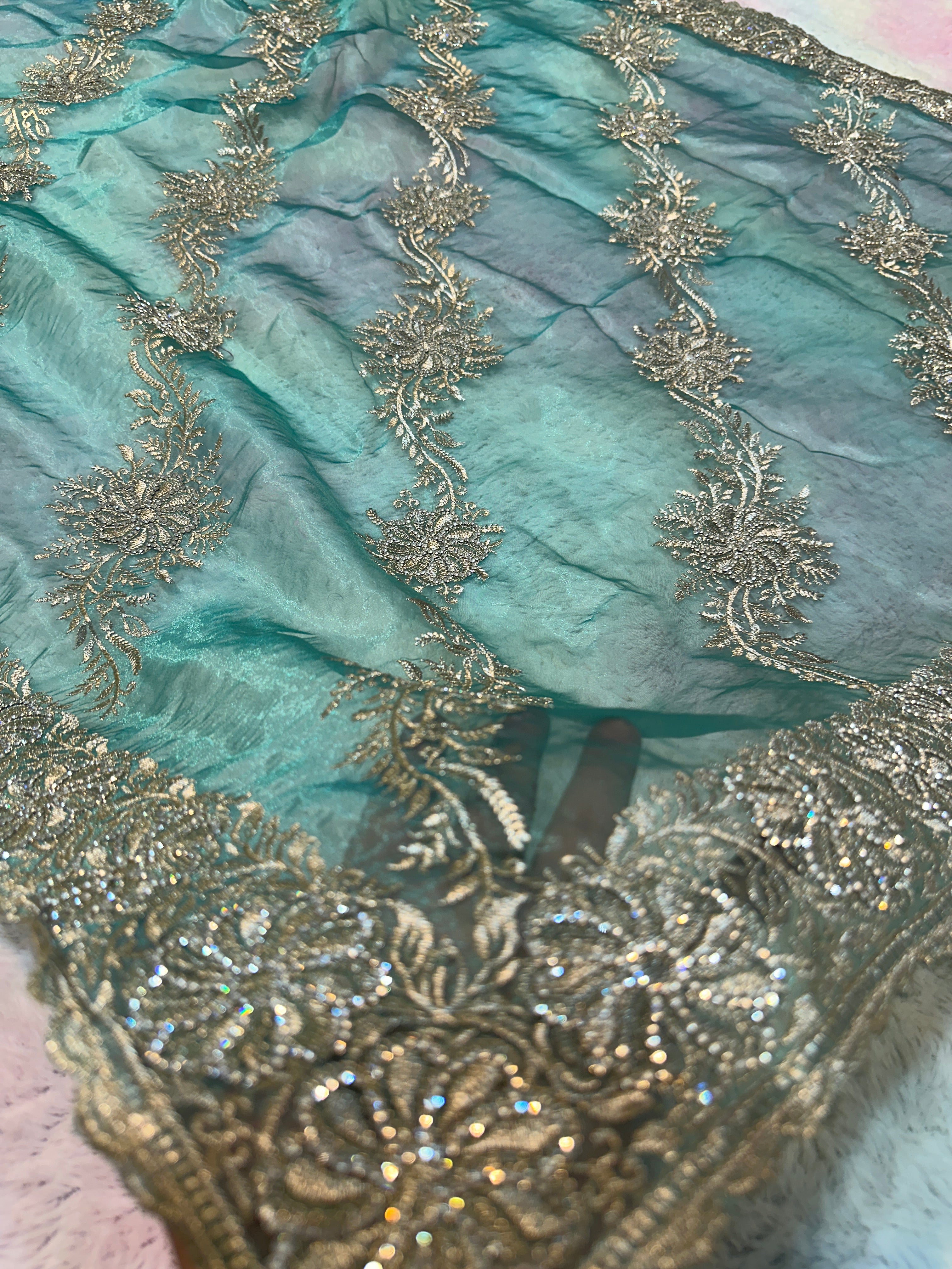 Sea green Organza Saree with Intricate Silver Floral Embroidery